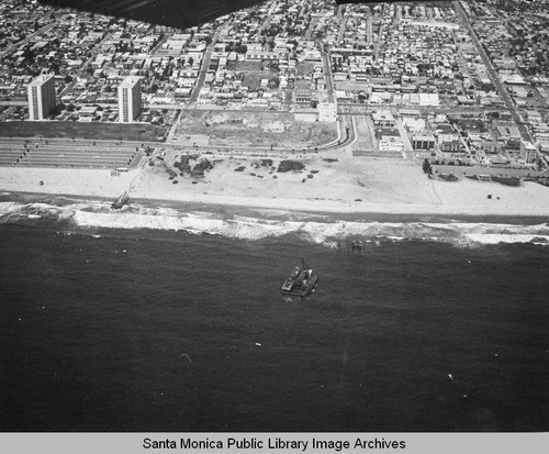 Looking east from the remains of the Pacific Ocean Park Pier toward Ocean Park and the Santa Monica Shores Apartments high-rise, June 18, 1975, 2:00 PM