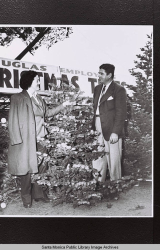 Fred Parker Gripsholm (WW II) returnee and Louisa Parker at the Douglas Aircraft Company Employees Christmas Tree lot