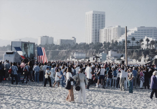 Crowds gathered to watch the reenactment of D-Day landing, Santa Monica, Calif