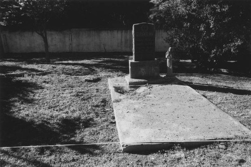 Headstone and grave of Pascual and Micaela Marquez showing the UCLA Cotsen Institute of Archaeology markers for radar imaging in the Family Cemetery, January 16, 2009