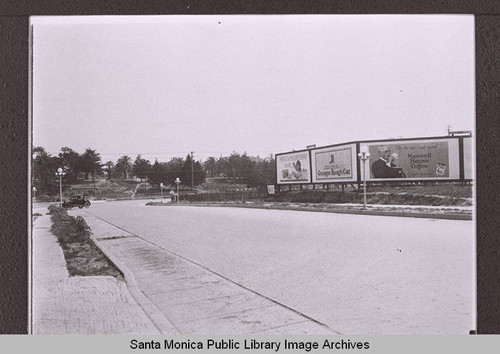 Billboards for White King Soap, Granger Rough Cut and Maxwell House Coffee north of Colorado Avenue, near the arroyo, Santa Monica, Calif