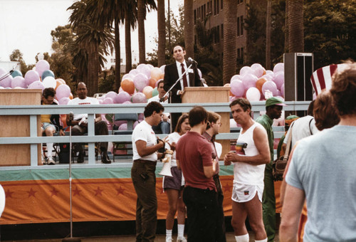 Santa Monica Mayor Ken Edwards behind the podium at Olympic torch relay on July 21, 1984, Santa Monica, Calif