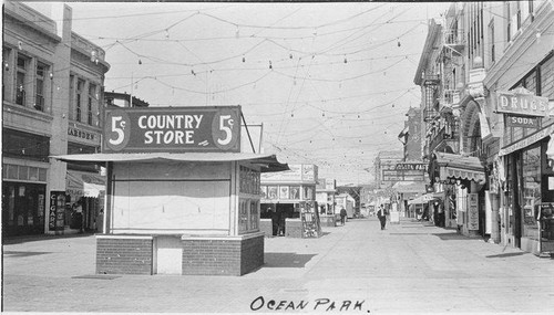 Looking down the Ocean Front Promenade from the "Country Store"and the Ocean Park Drug Company, Santa Monica, Calif