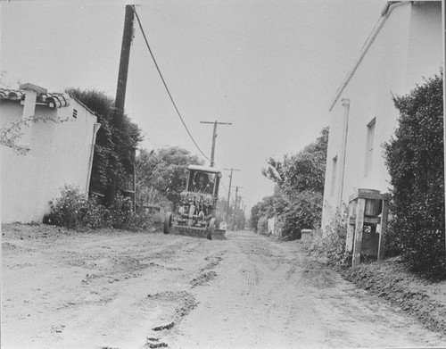 Alley grading and clean-up in the fifteenth alley above Montana Avenue in Santa Monica