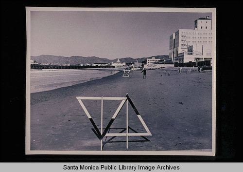 Tide studies with high tide markers looking north to the Santa Monica Pier (targets pointing upwards are the 1921 mean high tide line) with tide 1.8 feet on February 9, 1939 at 9:58 AM