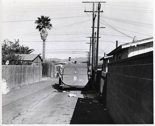 Sanitation worker and truck, Santa Monica, Calif