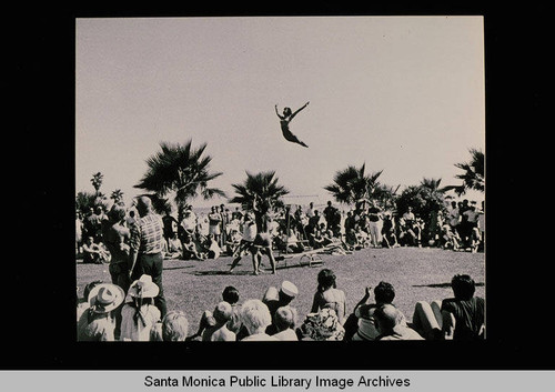 Paula Dell in the air at Muscle Beach, Santa Monica, Calif