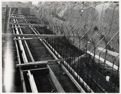Construction of the Santa Monica Municipal Pool showing copper water stop and pipe chase in footing, July 25, 1950