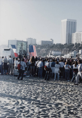 Crowds gathered to watch the reenactment of D-Day landing, Santa Monica, Calif