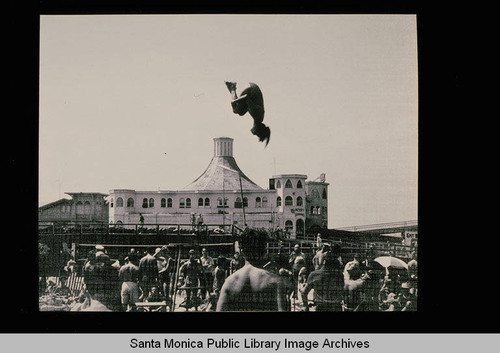 Paula Dell in a full gainer tuck at Muscle Beach, Santa Monica, Calif