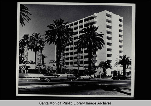 Automobiles drive past the Miramar Hotel, 101 Wilshire Blvd.,Santa Monica, Calif. (original hotel built 1924)