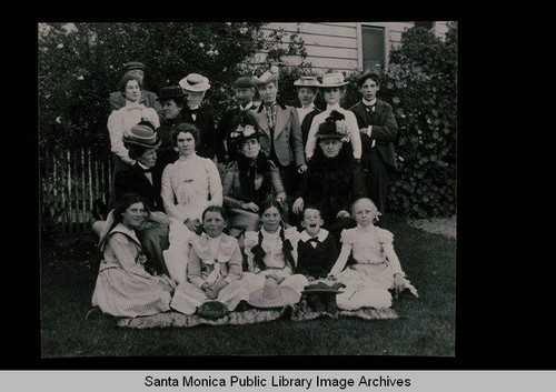 Family group on the lawn at the Grasett home, Santa Monica, Calif