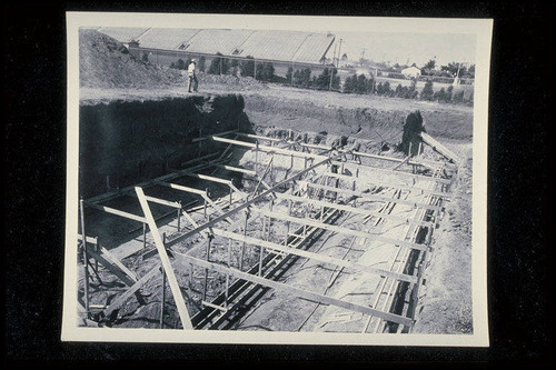 Construction of the Santa Monica Municipal Pool, footing forms including keyway pipe chases being placed, August 1, 1950