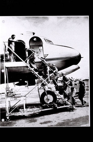 Troop 12 Boy Scouts boarding an airplane while visiting the Douglas Santa Monica plant