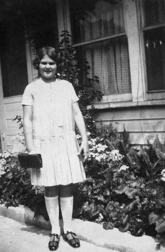 Adelaide Freeman, age 11, photographed in front of the house on Grand Avenue, Santa Monica, Calif