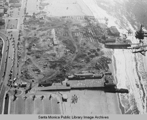 Aerial view of the remains of the Pacific Ocean Park Pier, Santa Monica, November 26, 1974, 10:30 AM