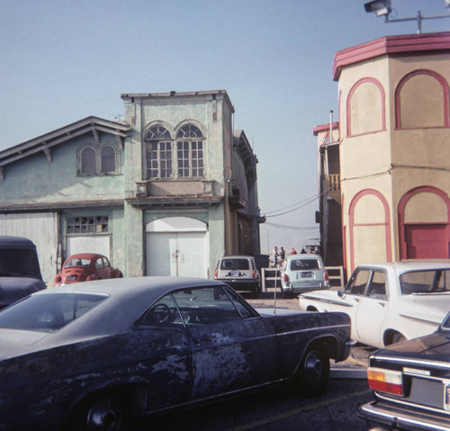 Cars parked near the Merry-go-round building on Santa Monica Pier