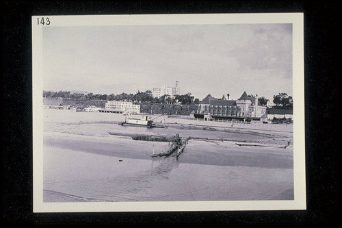 Dredging the lagoon north of the Santa Monica Municipal Pier with the dredge, Anita, in front of the Deauville Club, December 15, 1938