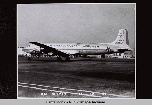 American Airlines DC-7 "Air freight" on tarmac in Santa Monica, Calif. on November 19, 1959