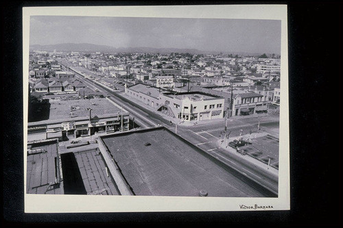 Intersection of Pier Avenue and Neilson Way looking northeast, POP billboard in foreground (Ocean Park Redevelopment Project)