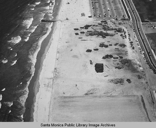 Looking north from the remains of the Pacific Ocean Park Pier to beach parking lots, July 3, 1975, 2:30 PM