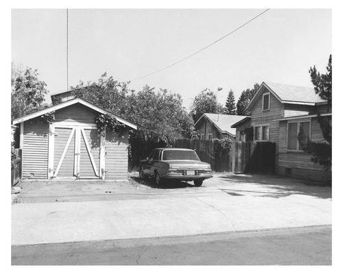 Looking northwest from Viriginia Avenue at garage and residence at 1958 High Place (foreground) and residence at 1954 High Place (background), Santa Monica, Calif., July 2009