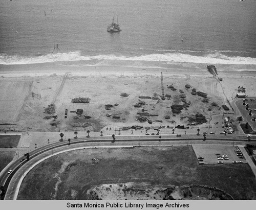 View of the remains of the Pacific Ocean Park Pier looking west to a barge in Santa Monica Bay, July 10, 1975, 2:30 PM