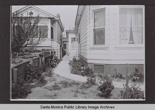 Detail of "For Rent" sign in the bay window of a house on Second Street near Colorado Avenue, Santa Monica, Calif