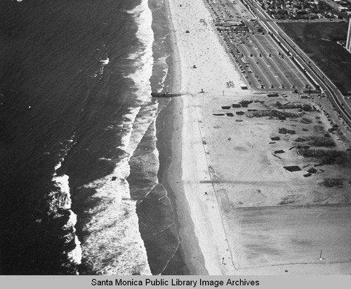 Looking north from the remains of the Pacific Ocean Park Pier to beach parking lots, June 25, 1975, 2:45 PM