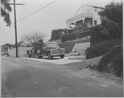 GMC truck and property development on Navy Place North looking west from Twenty-Third Street in the Sunset Park area of Santa Monica