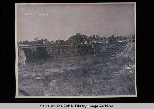 View of the pits between Cloverfield Blvd. and Twenty-Sixth Street, Santa Monica, Calif. separated by a trestle which was a spur of the Pacific Electric tracks on March 1, 1939