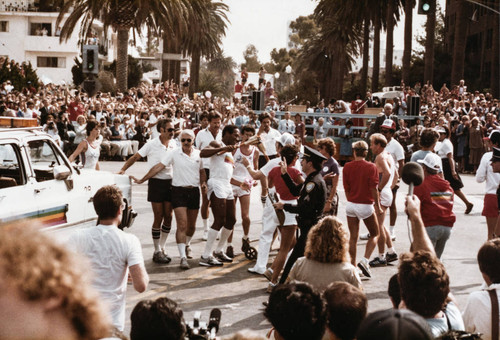 O.J. Simpson passing the Olympic torch on July 21, 1984, Santa Monica, Calif
