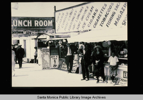 Loring's Lunchroom, Mr. Loring's daughter, husband and granddaughter standing in front of Loring's Lunchroom, Santa Monica, Calif