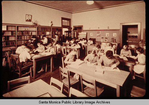 School library interior with picture of Charles Lindbergh on the wall