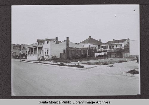 Colorado Avenue and Second Street looking west to the Sunset Inn near the arroyo, Santa Monica, Calif