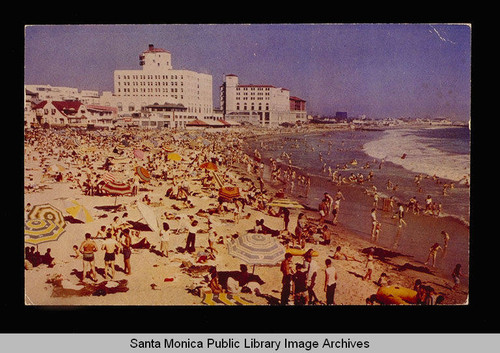 Breakers (1725 Promenade); Edgewater (1855 Promenade) and Del Mar Club (1901 Promenade) and beach crowds south of the Santa Monica Pier