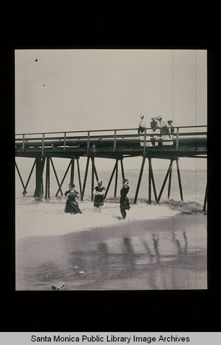 Bathers by a pier (Santa Monica, Calif.?)