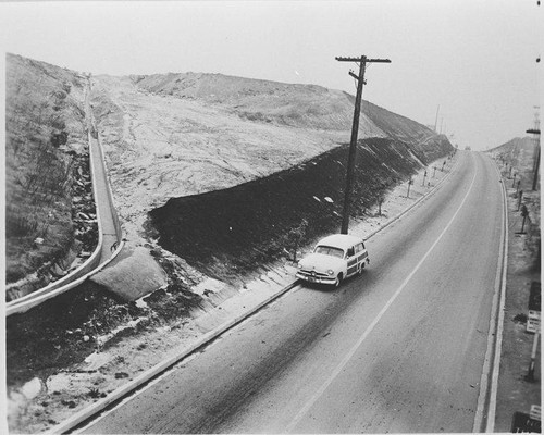 Automobile driving by drainage route from Santa Monica Municipal Airport, January 19, 1953