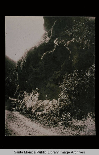 Overhanging rock at the narrows on Old Topanga Canyon Road, Topanga, Calif