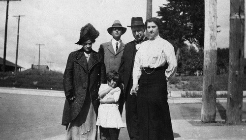 Mrs. D.C. Freeman, Mr. D.C. Freeman, Mr. Leslie Robertson, Mrs. Leslie Robertson, Miss Jeanette Freeman (L to R) photographed at Fourth Street and Hill in Ocean Park, Santa Monica, Calif