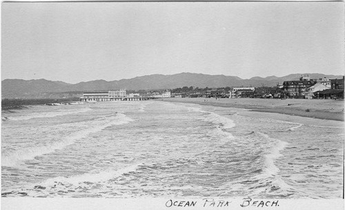 Beach and waves looking north to the Ocean Park Pier, Santa Monica, Calif