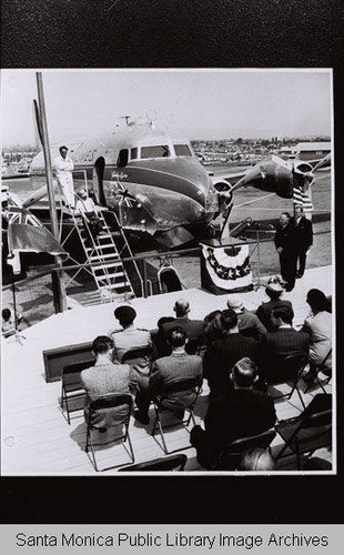 Christening the new trans-Australian Airliner DC-4 "John Eyre" at the Santa Monica Airport on September 16th (left to right: Ambassador Norman J.O. Marin of Australia and General Victor E. Bertrandias, V.P. Foreign Sales)