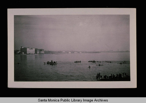 Surfer's festival with the Edgewater and Del Mar beach clubs in the distance, Santa Monica, Calif