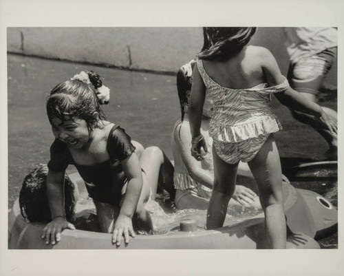 Children laughing in the pool, St. Joseph Center, Venice, Calif