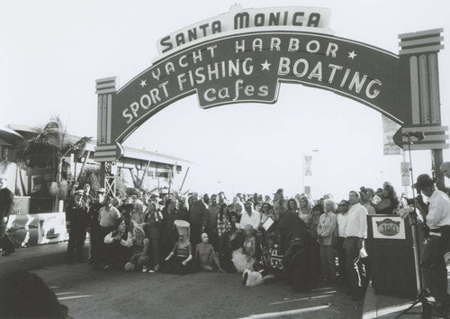 Mayor Ken Genser cutting the ribbon at the Santa Monica Pier Centennial celebration, September 9, 2009