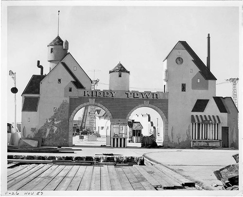 Half-demolished Kiddy Town area at Ocean Park Pier while the site was in process of becoming Pacific Ocean Park, November 1957, Santa Monica, Calif