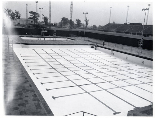 Construction of the Santa Monica Municipal Swimming Pool showing pool after painting with race lane markers, May 18, 1951