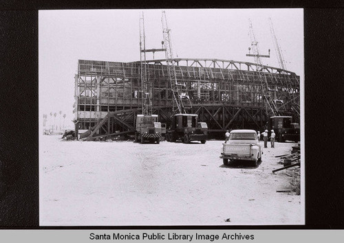 Chevrolet pick-up truck in front of the Santa Monica Civic Auditorium construction in July 1957