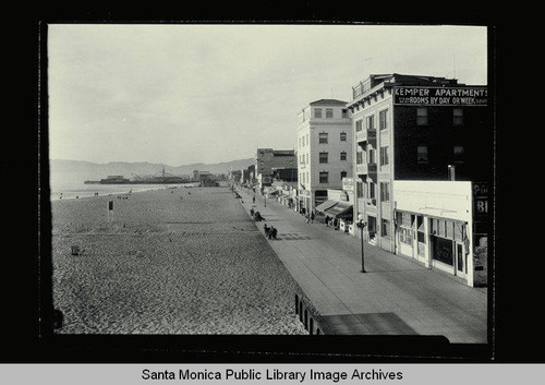 Looking up Ocean Front Walk from the Ocean Park Bathhouse with the Kemper Apartments in foreground on November 17, 1929