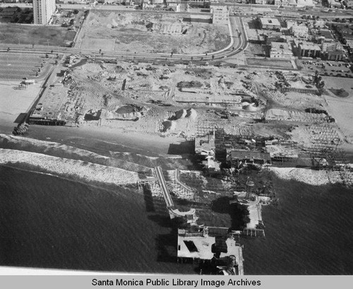 Aerial view of the remains of the Pacific Ocean Park Pier, Santa Monica looking east toward Neilson Way, December 23, 1974